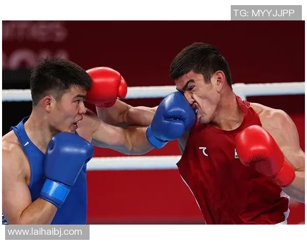 拳击——男人80公斤级八分之一决赛:托合塔尔别克·唐拉提汗晋级